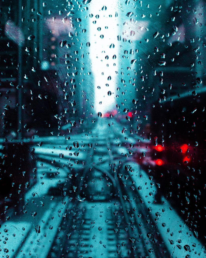 city street through rainy glass