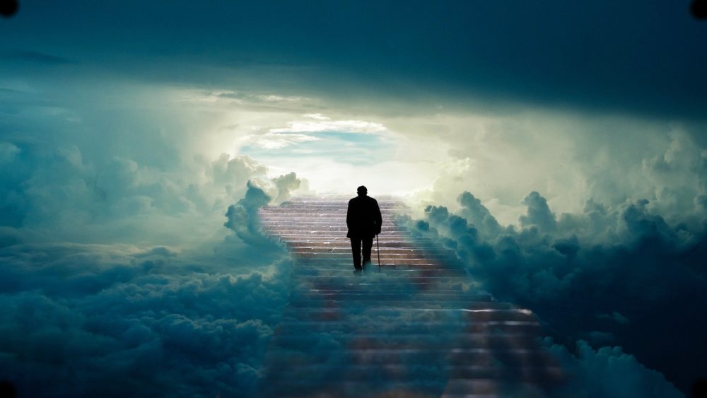 man walks in cloud tunnel