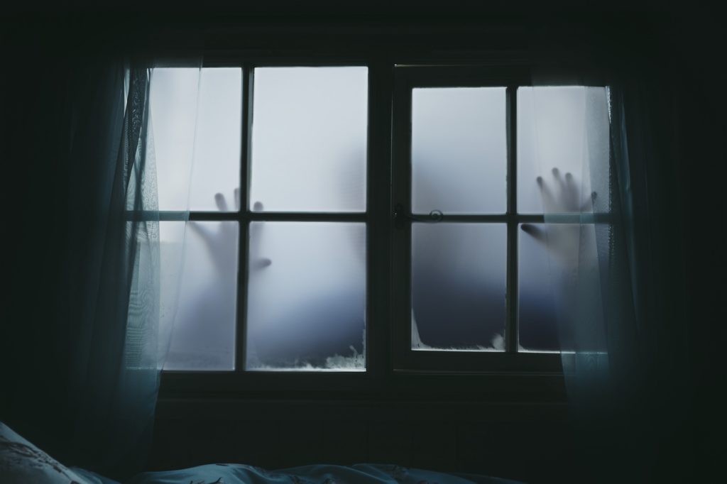 creepy hands in window
