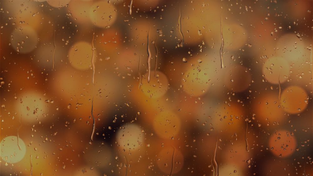 bokeh orange lights on rainy glass